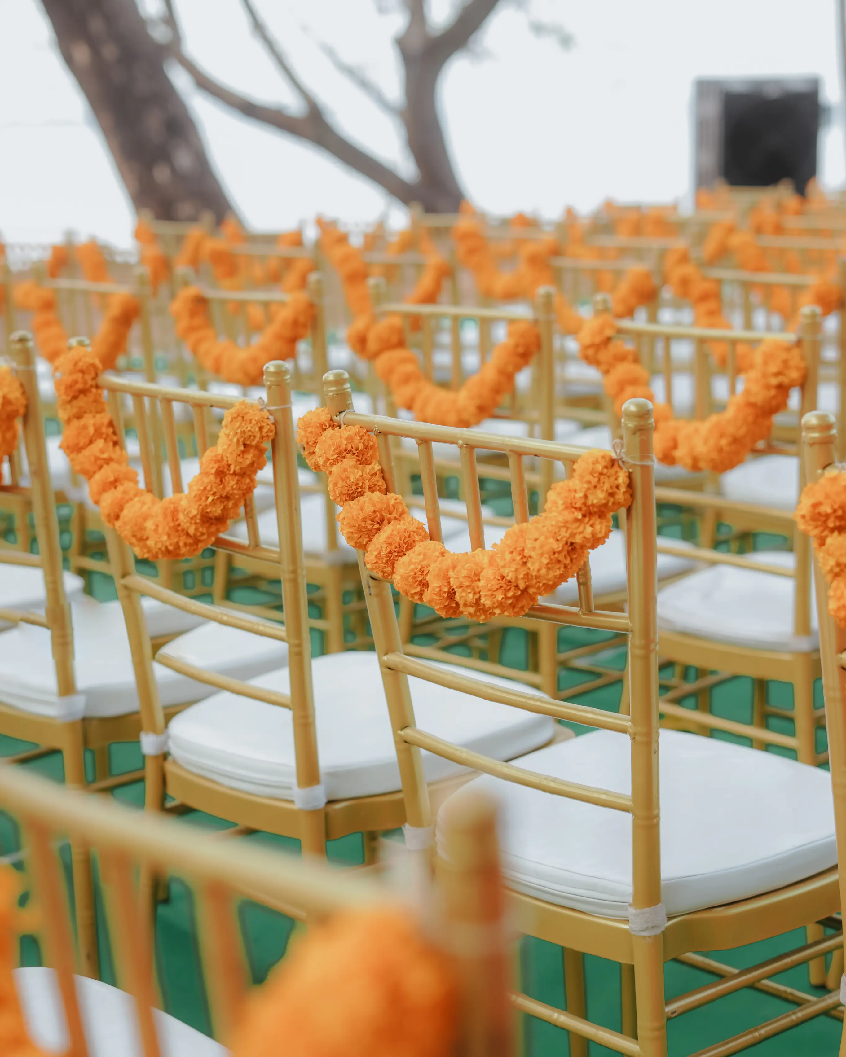 Wedding seating with marigold garlands